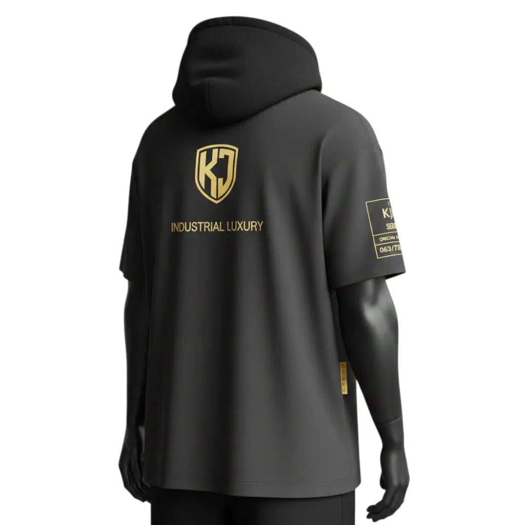 Back view of KJ Origin Drop premium short-sleeve hoodie in heavyweight matte black fabric featuring gold-embossed KJ shield logo.